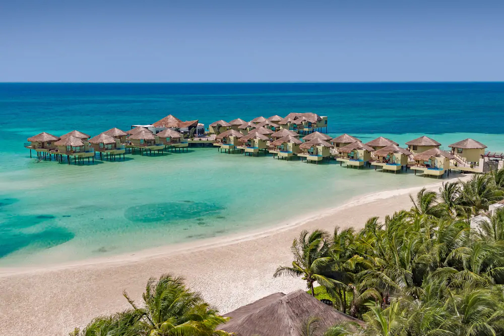 Here Are The Resorts in Mexico's Riviera Maya Offering the Most Unique Amenities & Exclusive Experiences / The Lama List / www.thelamalist.com / Photo courtesy Palafitos Overwater Bungalows